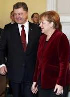 Poroshenko, Merkel discuss Minsk agreements implementation, release of hostages