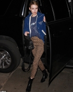 Emma Roberts looks effortlessly chic as she styles a cord jacket with leopard