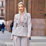 Rita Ora poses TOPLESS while 'waiting for spray tan to dry' before sharing