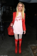 Tara Reid celebrates Valentine's Day with racy red lace stockings