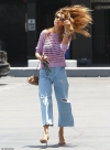 Alessandra Ambrosio oozes summer cool in perforated lilac sweater