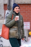 Maggie Gyllenhaal sips on a warming beverage as she runs errands in chilly