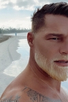 Ricky Martin delivers Santa on vacation vibes as he debuts newly bleached beard in beach selfie