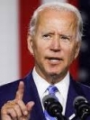 Biden vows 'disaster' for Russia if it invades Ukraine